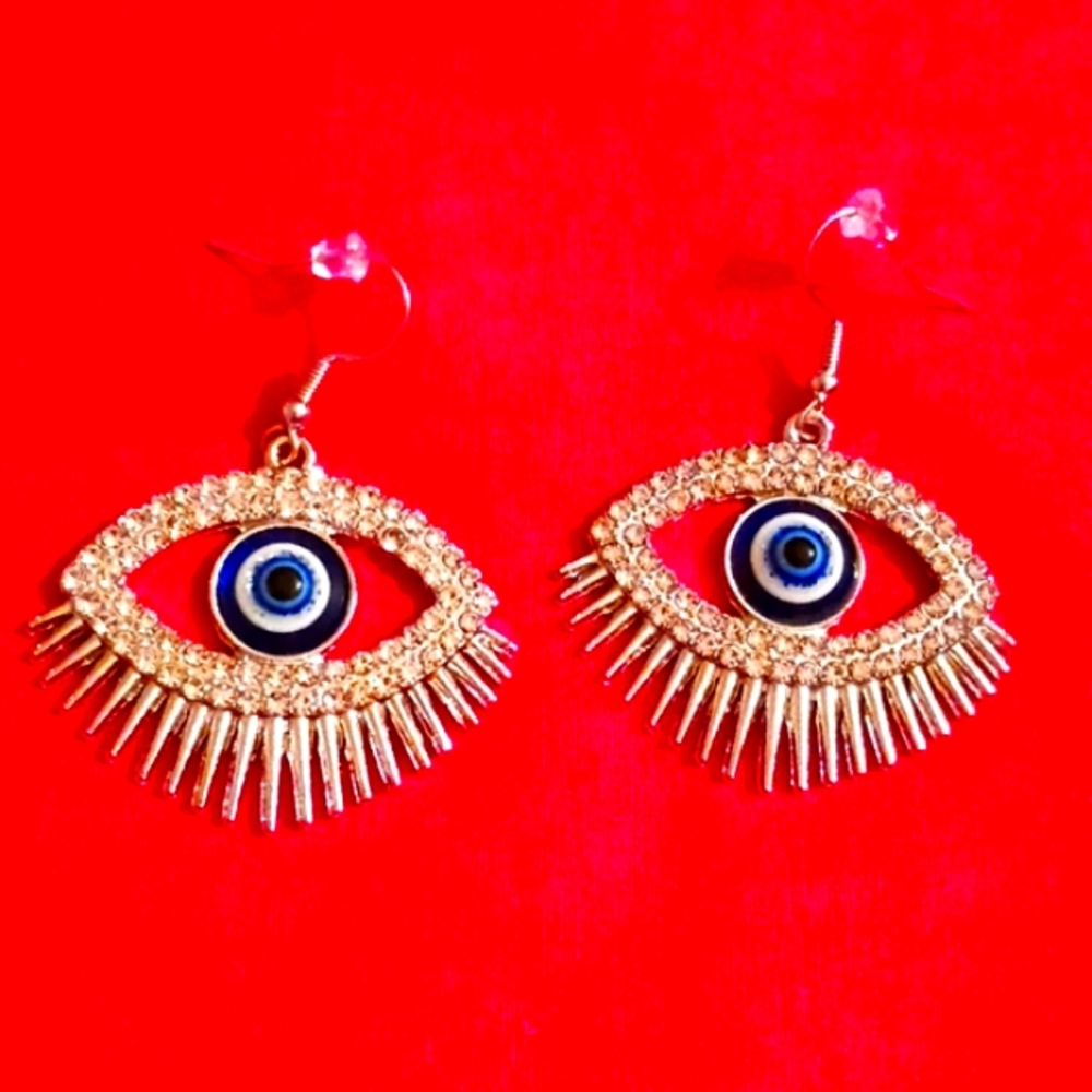 Beautifully detailed evil eye earrings that stand out make a witchy statement
